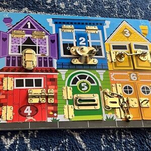 Melissa & Doug Vibrant Latch Board with Numbers